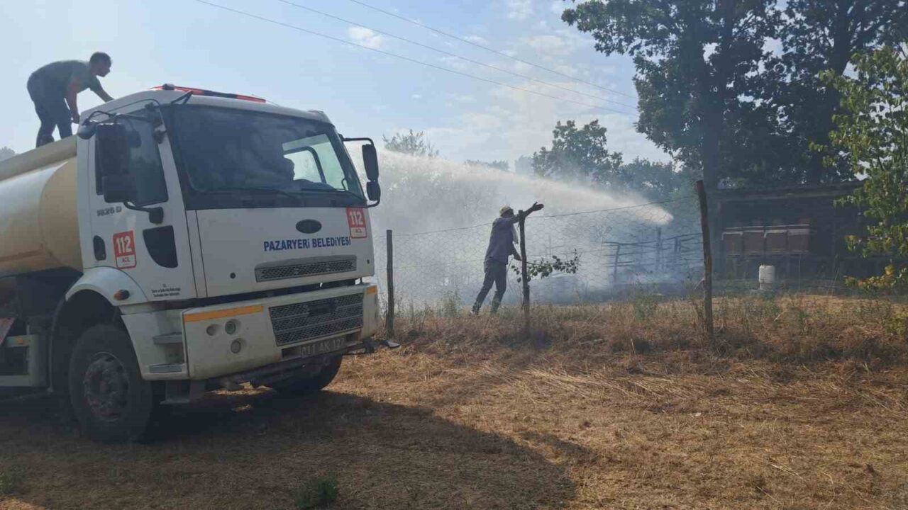 Bilecik’in Pazaryeri ilçesinde tarım arazisinde çıkan yangın, ekiplerin havadan ve