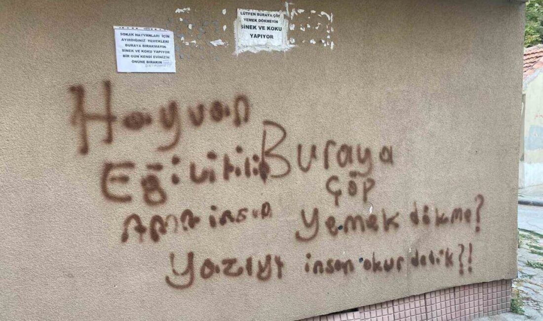 Eskişehir’de bir binanın duvarına, çöp ve yemek dökülmemesi ile ilgili