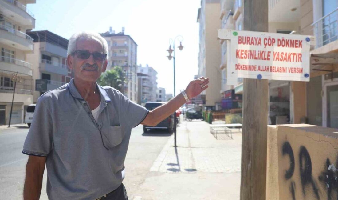 Hatay’da iş yerinin olduğu apartman köşesine sürekli çöp atılmasından usanan