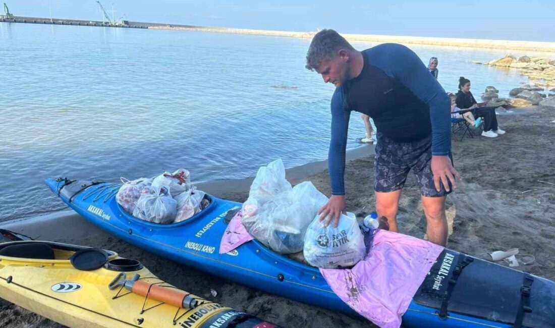 Kastamonu’nun İnebolu ilçesinde bir sporcu, sahile atılan çöpleri tek tek