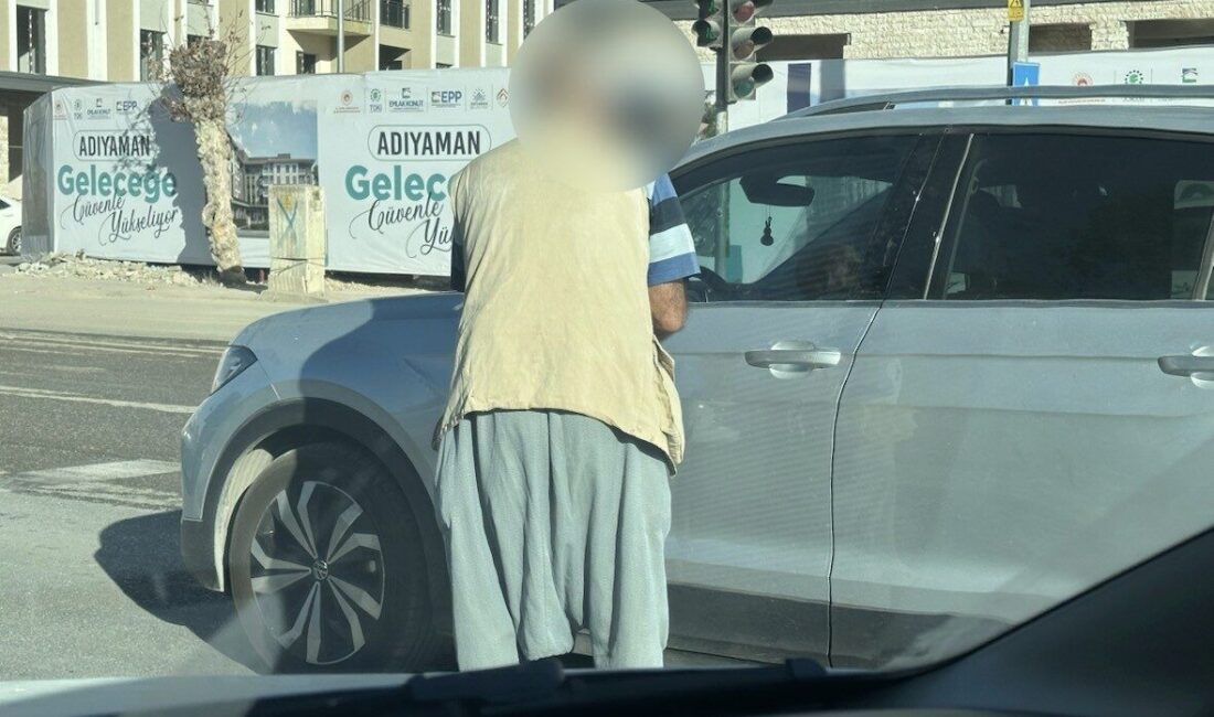 Adıyaman’da özellikle trafik ışıklarında araçların önünü keserek para isteyen dilenciler,