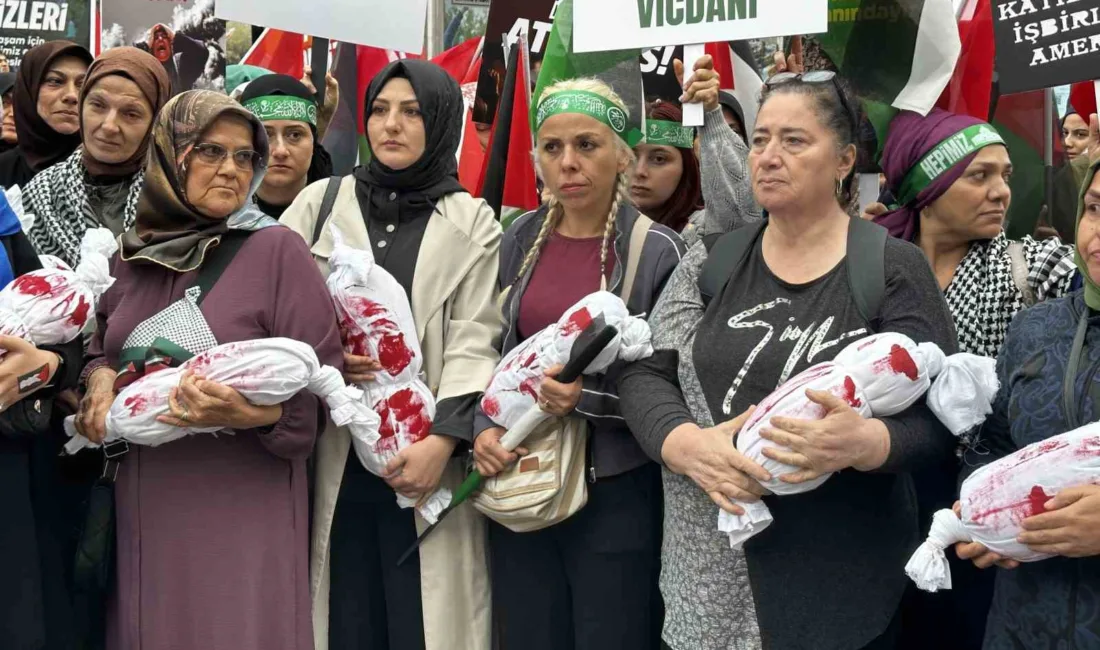 Ümraniye’de düzenlenen Filistin’e destek yürüyüşünde, katılımcılar ellerinde taşıdıkları temsili bebek