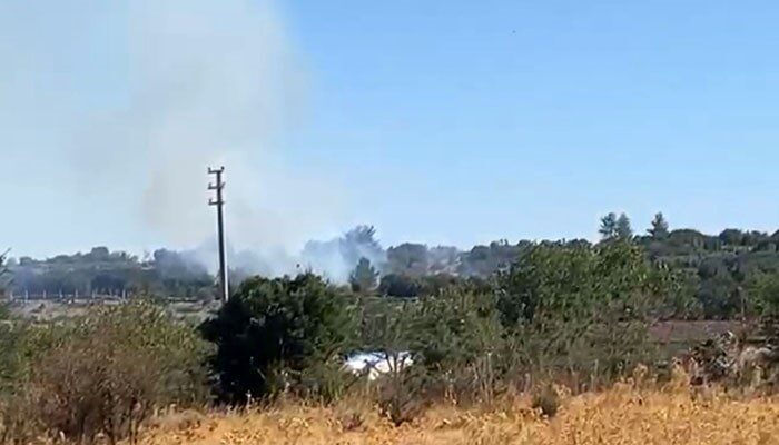 Muğla’nın Menteşe ilçesinde makilik alanda çıkan yangını kontrol altına alabilmek
