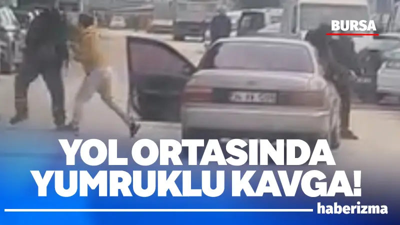 Bursa’da iki sürücünün yol ortasında yumruk yumruğa kavga ettiği anlar