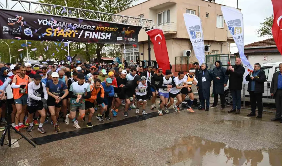 Karacabey’in turizm bölgesi Yeniköy’de yağmura rağmen 450 sporcunun 25 ayrı