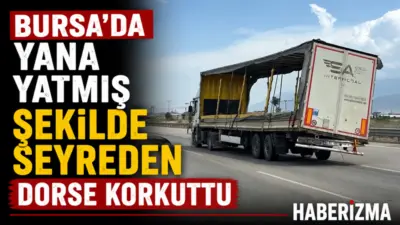Bursa’da trafikte ilerleyen bir tırın yana yatmış şekilde seyreden dorsesi,