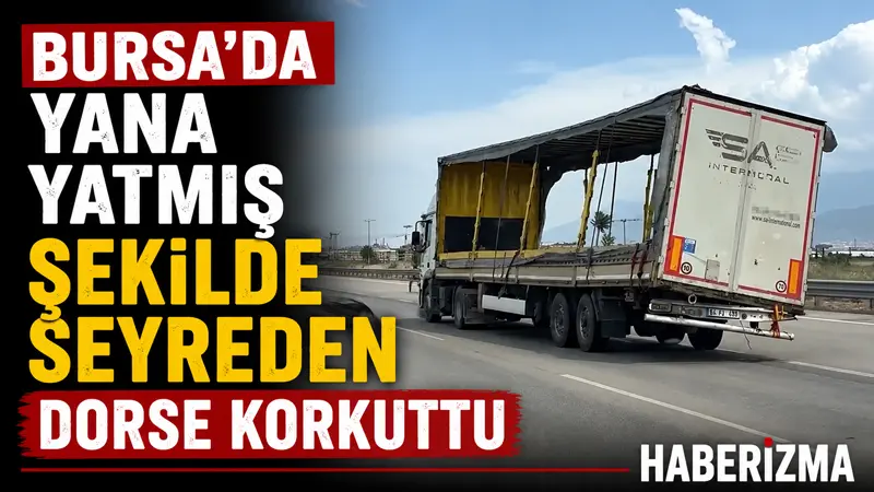 Bursa’da trafikte ilerleyen bir tırın yana yatmış şekilde seyreden dorsesi,
