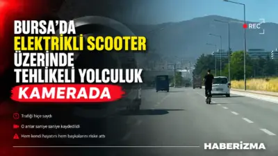 Bursa’da elektrikli scooter sürücüsünün trafikteki tehlikeli ilerleyişi cep telefonu kamerasına
