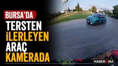Bursa’da bir sürücü, trafik adasına tersten girerek ters istikamette ilerledi.