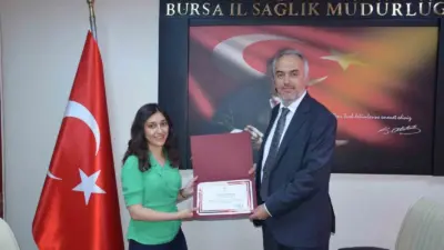Bursa İl Sağlık Müdürü Uzm. Dr. Mustafa Çetin, anne ve