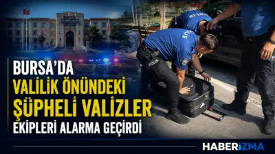 Bursa’da Valilik Ek Hizmet Binası karşısındaki açık otoparkta bulunan iki