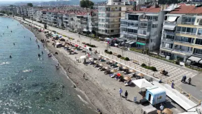 Yaz sıcaklarının etkisini artırmasıyla birlikte Mudanya plajları tatilcilerin akınına uğradı.