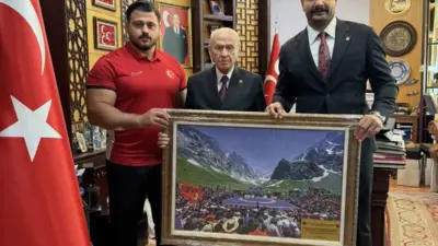 Türkiye Güreş Federasyonu Başkanı Taha Akgül ve Rıza Kayaalp, Milliyetçi