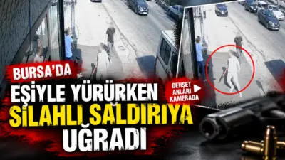 Bursa’da eşiyle birlikte yolda yürüdüğü sırada husumetli olduğu kişilerin silahlı