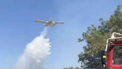 Balıkesir’in Kocaavşar Mahallesi yakınlarında çıkan orman yangınına havadan ve karadan