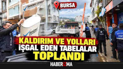 Nilüfer Belediyesi ekipleri, yaya, bisiklet ve engelli yollarını kapatan tabela,
