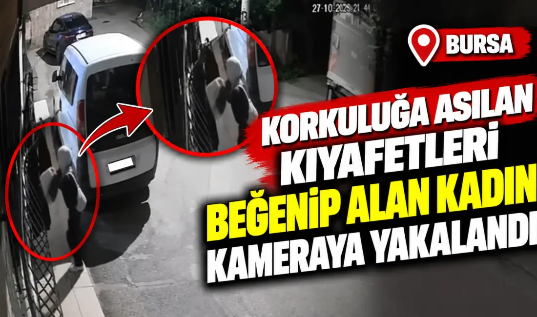 Bursa’da bir kadın, evin penceresinde kurutmak üzere asılı olan kıyafetleri