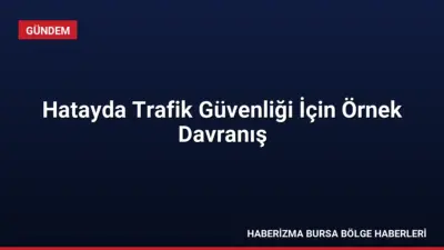 Hatay'da bir polis memuru, kaza sonrası yola dökülen motor yağını